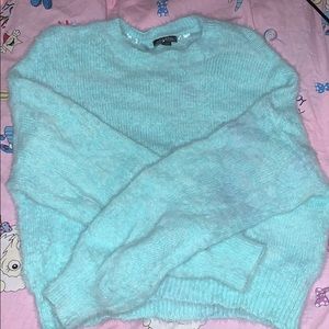turquoise sweater